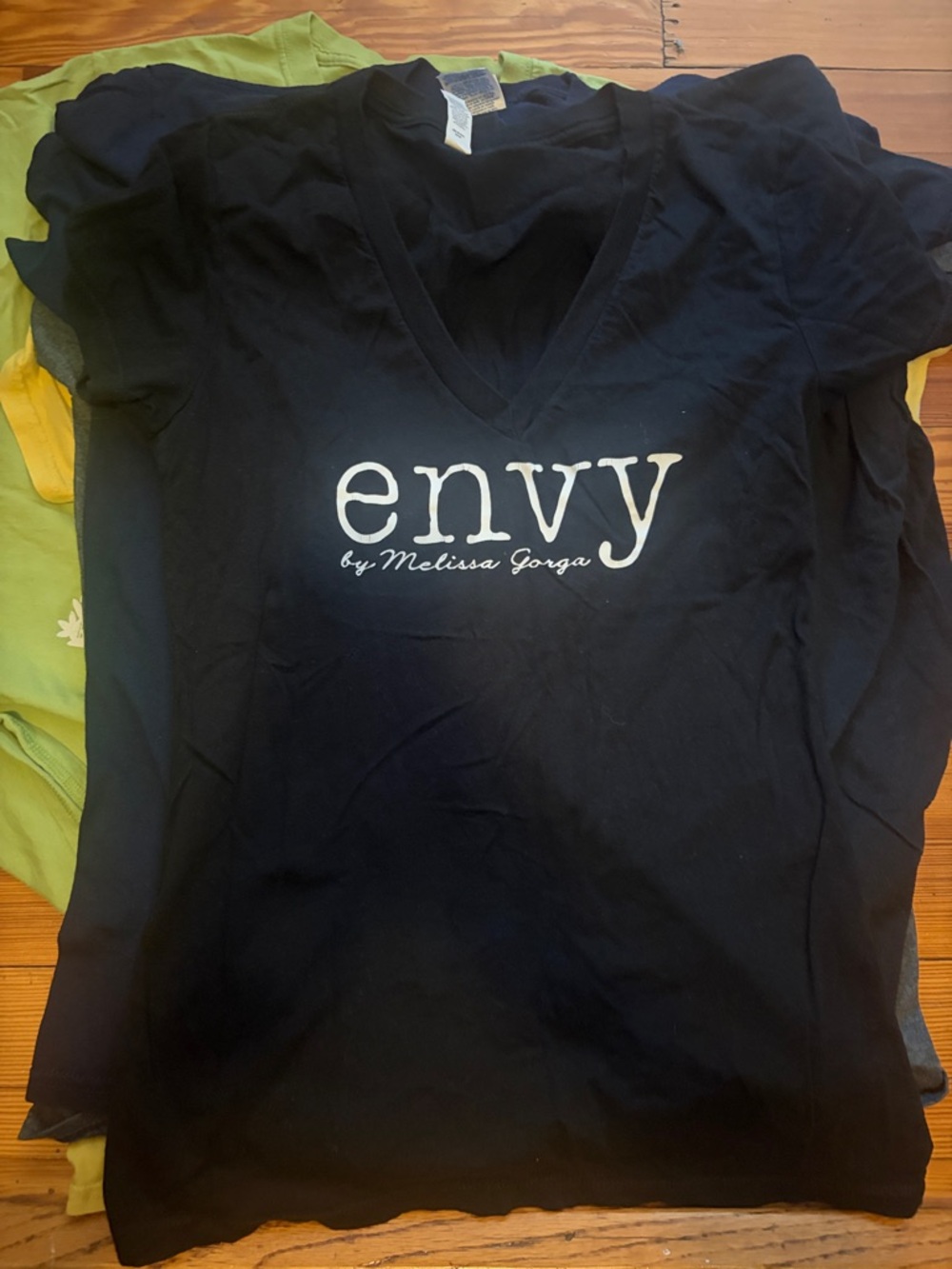 Envy by Melissa Gorga Bella Canvas Black V-Neck Tee with "envy" White Script